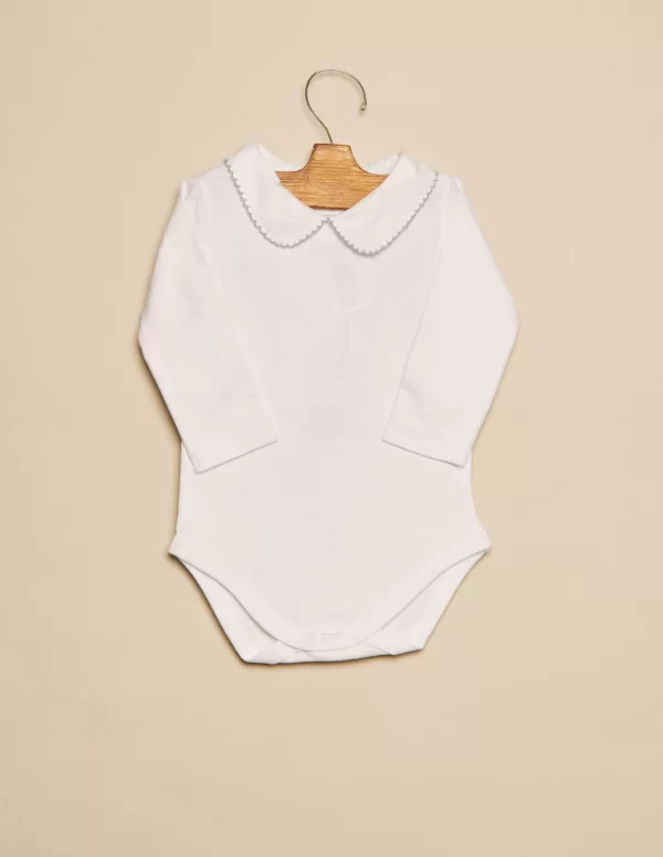 body_cuello_beb_pespuntes_0-2.webp NÍCOLI Body cuello bebé pespuntes azul< Bodies
