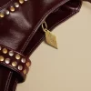 NÍCOLI BOLSO TACHAS MARRÓN< Bolsos