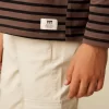 NÍCOLI CAMISETA SOLIDARIA RAYA GRANDE MARRÓN< Camisetas