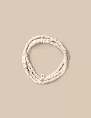 NÍCOLI Collar largo bolitas crudo< Collares | Collares