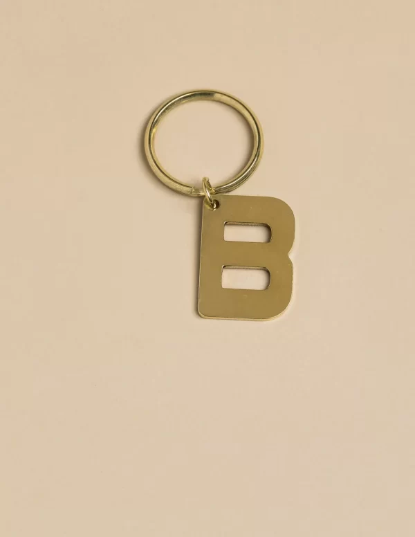 NÍCOLI LLAVERO 'B' DORADO< Llaveros | Llaveros