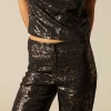 NÍCOLI PANTALÓN ANIMAL PRINT BRILLO< Pantalones