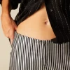 NÍCOLI PANTALÓN BRILLO RAYADO< Pantalones