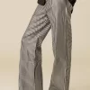 NÍCOLI PANTALÓN BRILLO RAYADO< Pantalones