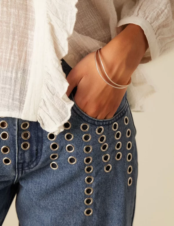 NÍCOLI PANTALÓN VAQUERO AZUL MIX TACHUELAS< Denim | Pantalones
