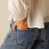 NÍCOLI PANTALÓN VAQUERO AZUL MIX TACHUELAS< Denim | Pantalones
